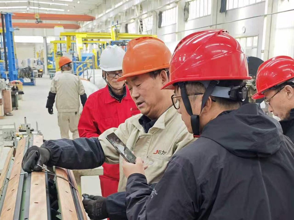 Factory site discussion with engineers